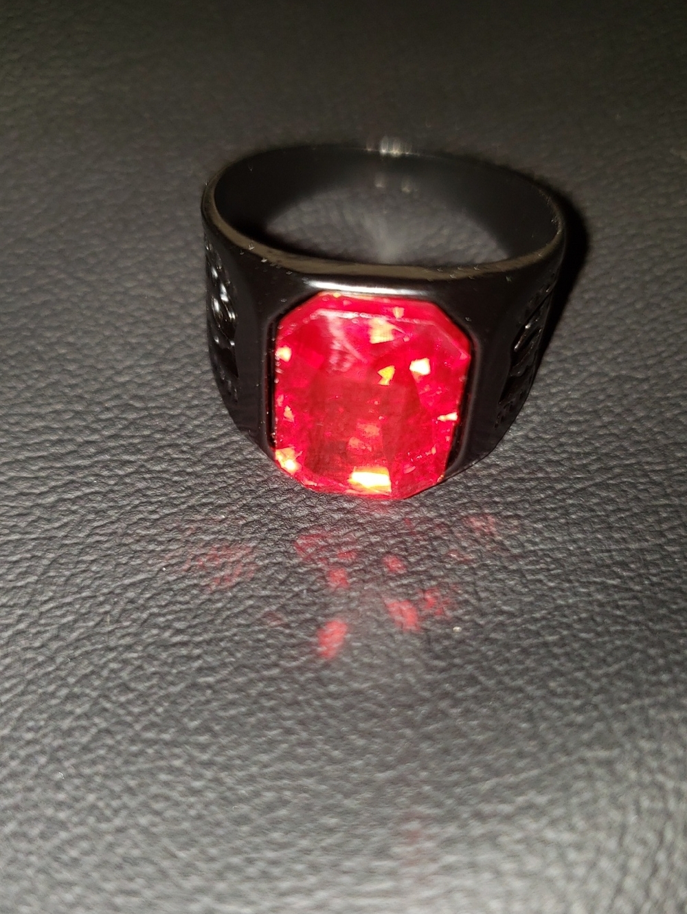 Black Ring with Large Red Faceted Stone